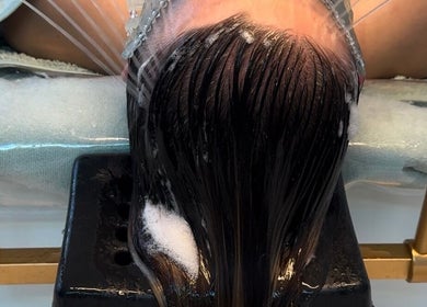 Relaxing hair treatment at Lough Skin, Loughborough, England, GB, showcasing premium scalp care.