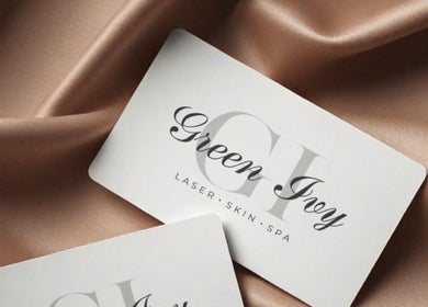 Elegant cards displaying 'Green Ivy Skin And Spa' logo on satin, Kettering, England, GB.