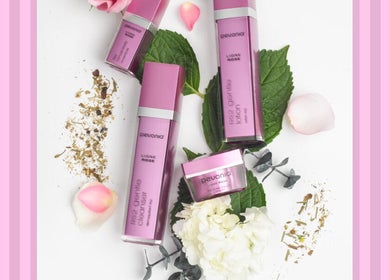 Luxurious beauty products at Green Ivy Skin And Spa, Kettering, England, GB, with rose petals and botanicals.