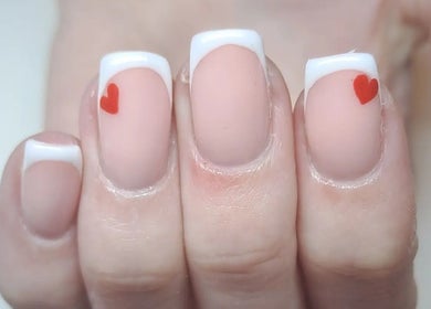 Elegant French manicure with heart art at Sculpted by Sarah, County Louth, County Louth, IE.