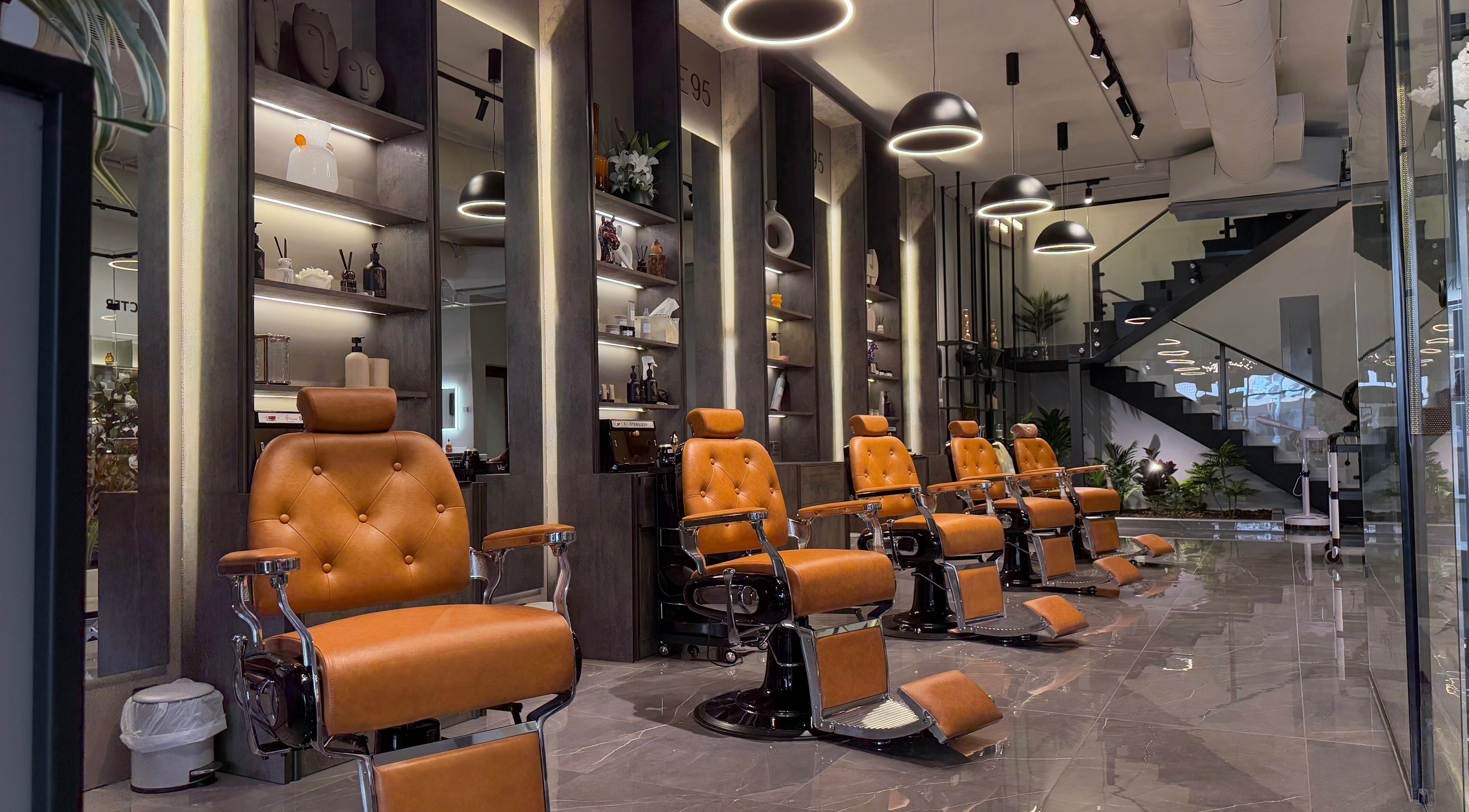 Luxurious barber chairs at The 95 Men Care Salon | Khobar Shamalia, Khobar, Eastern Region, SA.