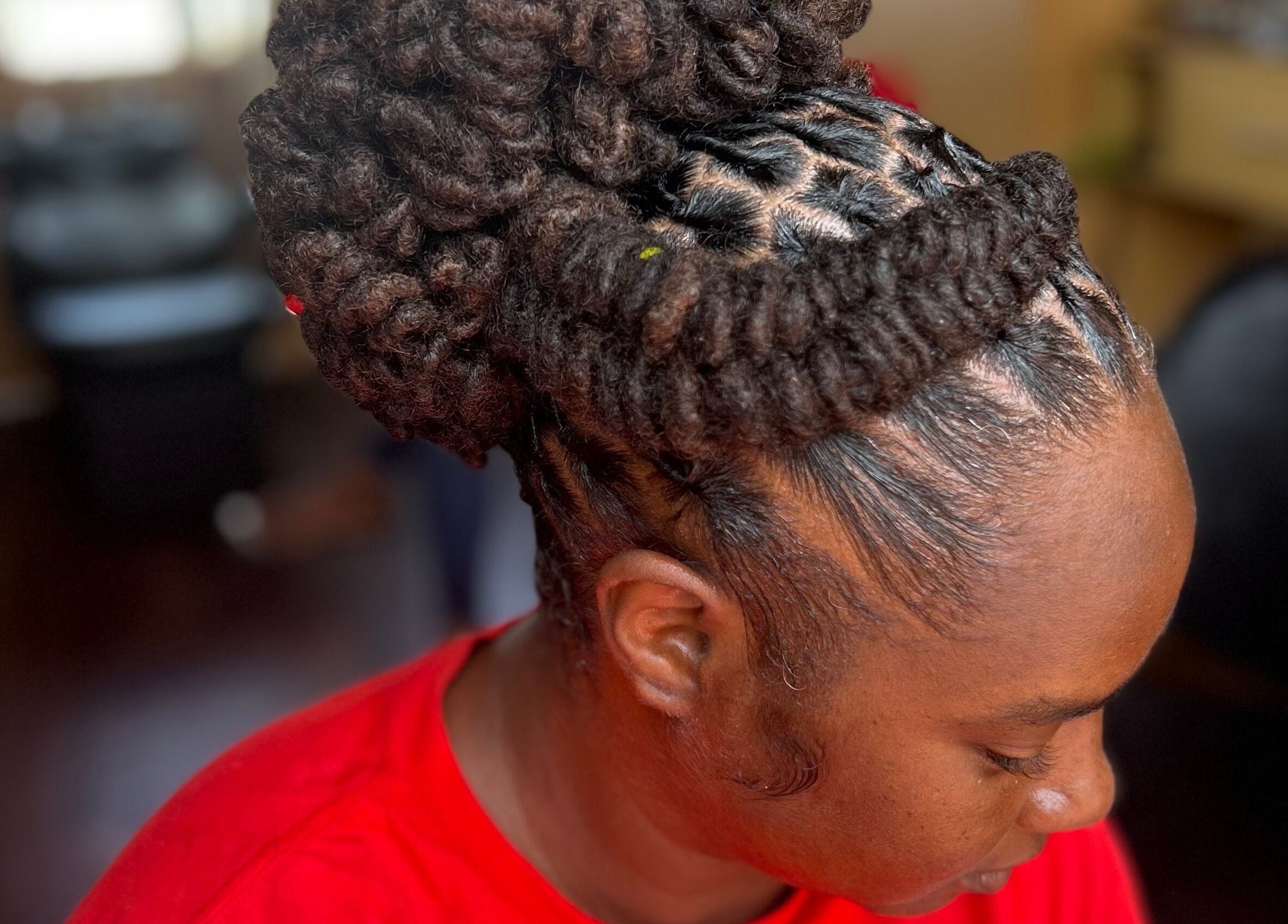 Intricate braided hairstyle created at LoudXtensions, Bridgetown, Saint George, BB. Stylish and professional look.