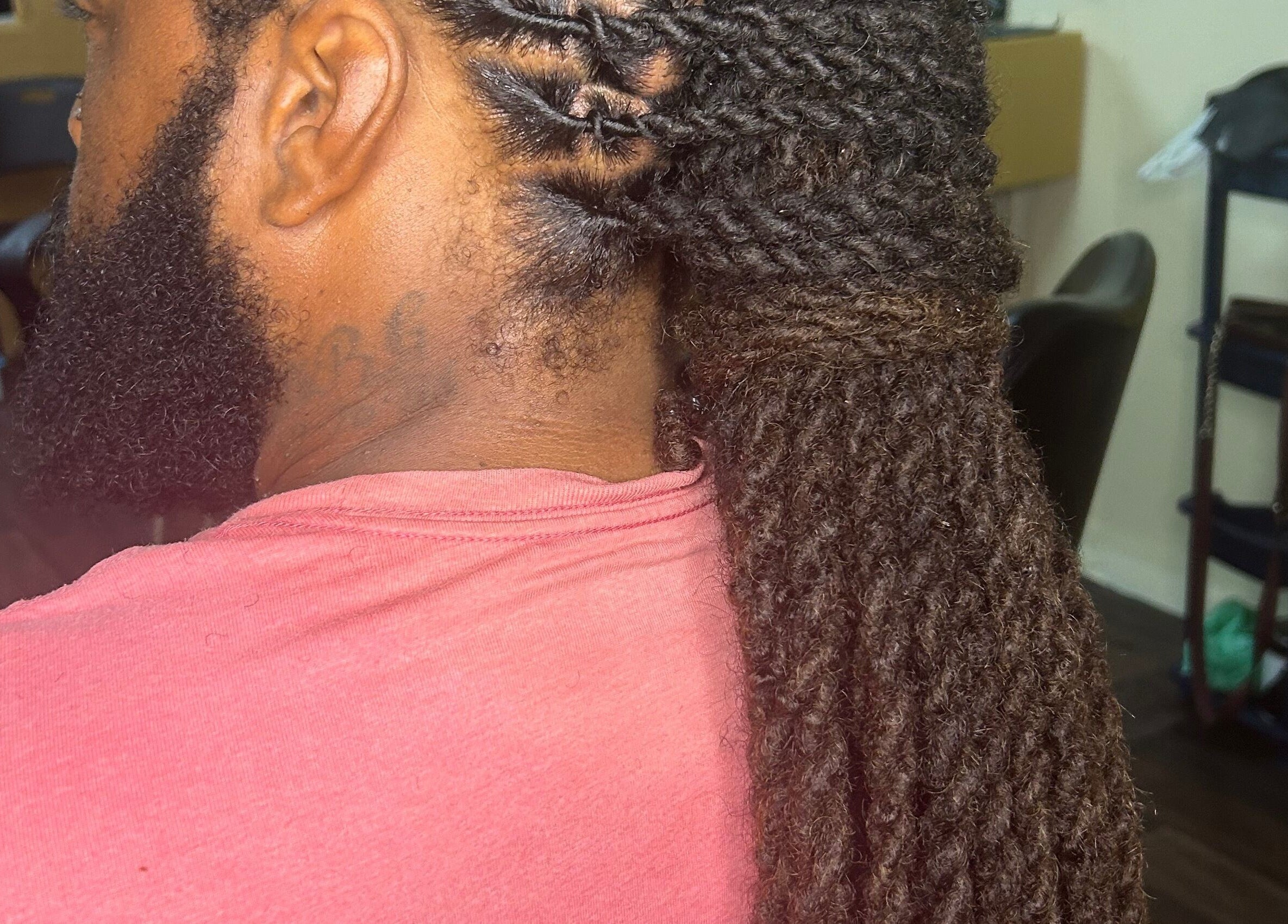 Intricate dreadlocks styling at LoudXtensions in Bridgetown, Saint George, BB offers expert hair transformations.