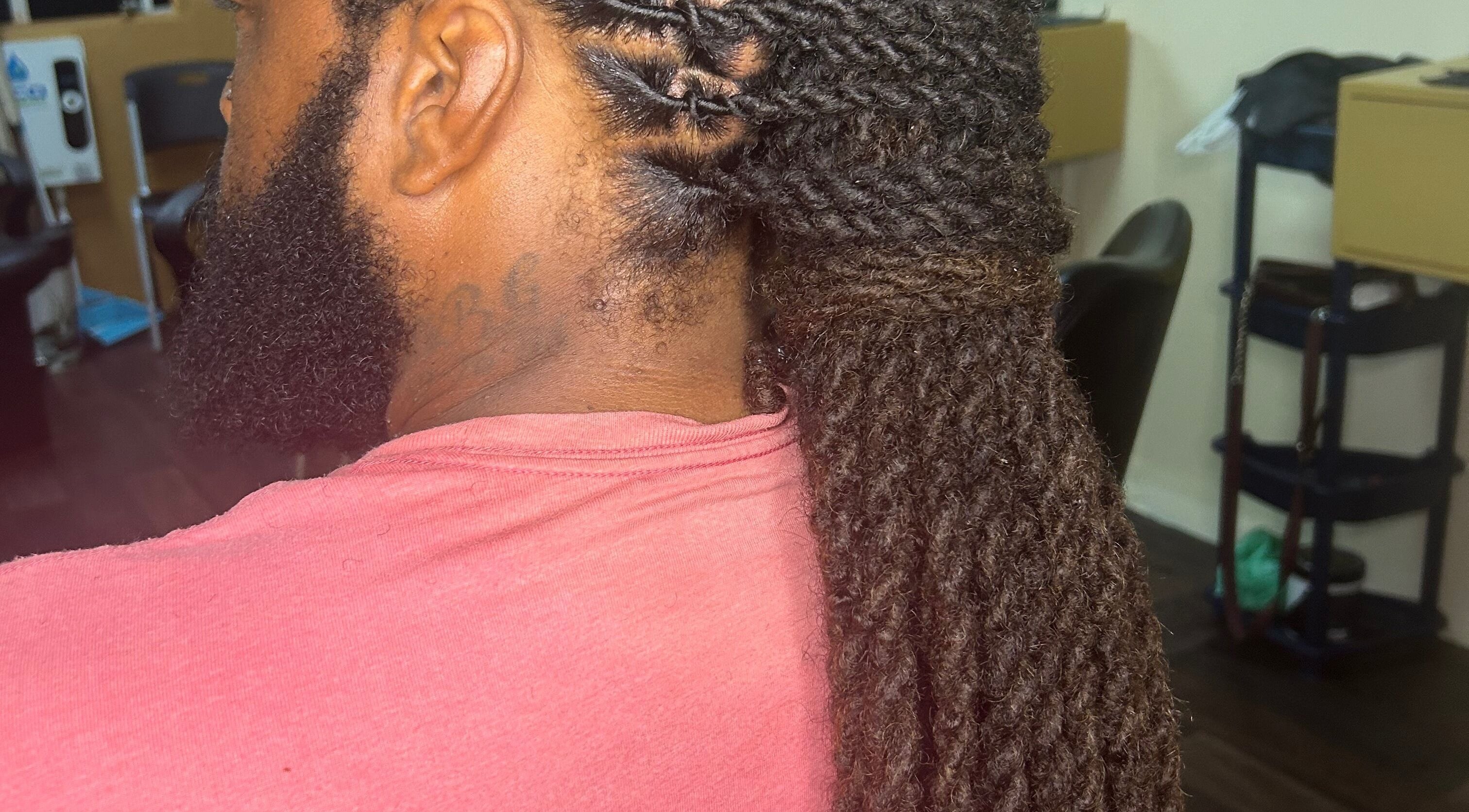 Intricate dreadlocks styling at LoudXtensions in Bridgetown, Saint George, BB offers expert hair transformations.