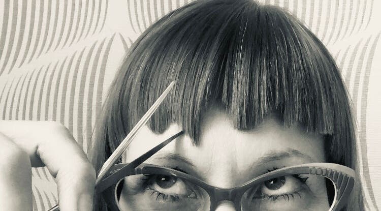 Close-up of chic fringe haircut at Simone * This Is Who We Are Collective, Leeds, England, GB.