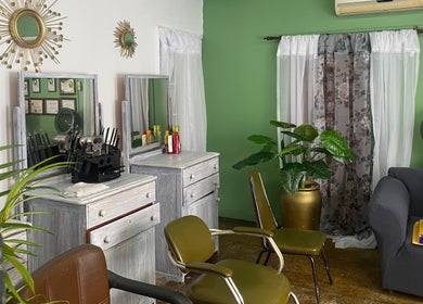Elegant salon interior at Stylin' Chic by Auldine's, Kingstown, St. George, VC with modern decor.