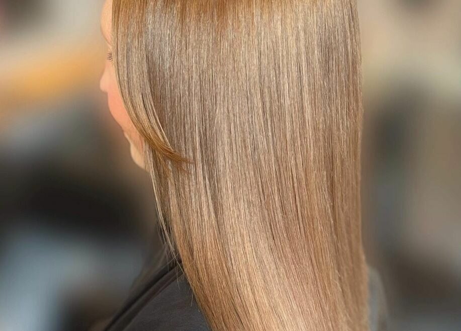 Sleek blonde hair styled perfectly at Ells Hair and Nails, Callington, England, GB.