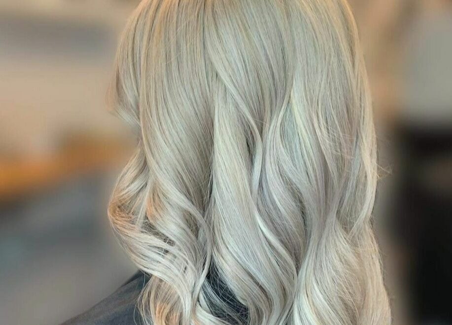 Elegant blonde curls styled at Ells Hair and Nails, Callington, England, GB.