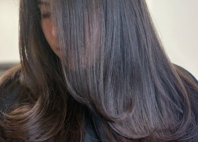 Smooth, shiny hair showcased at Melval Hair Studio in Toronto, Ontario, CA.
