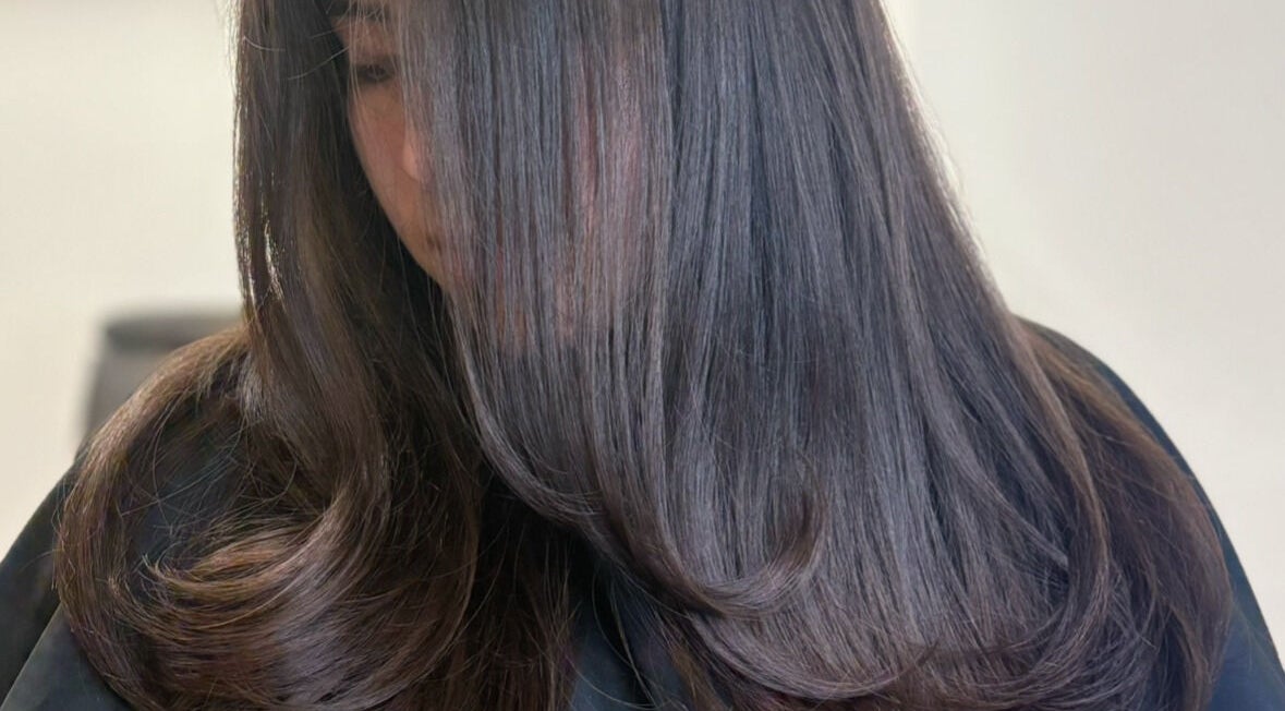 Smooth, shiny hair showcased at Melval Hair Studio in Toronto, Ontario, CA.