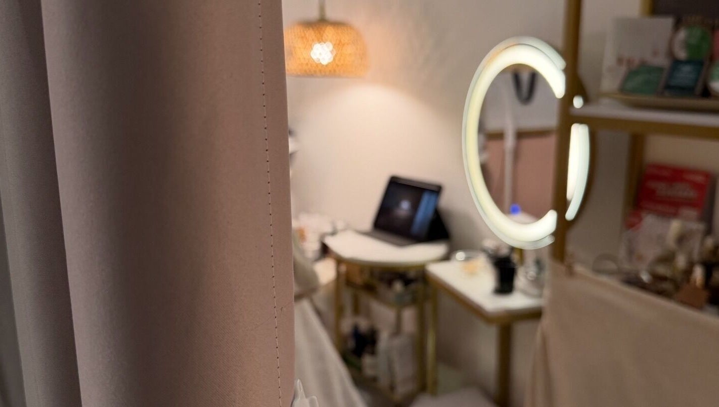 Cozy vanity space at Rosa Damascena Hong Kong on Hong Kong Island, HK, featuring elegant lighting and decor.