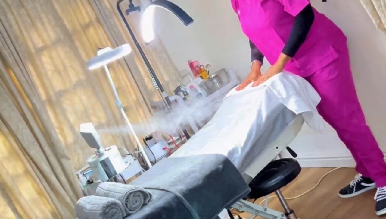 Relaxing treatment room at BeautyHuntt Aesthetics Clinic, Lekki, Lagos, NG with massage table and soft lighting.