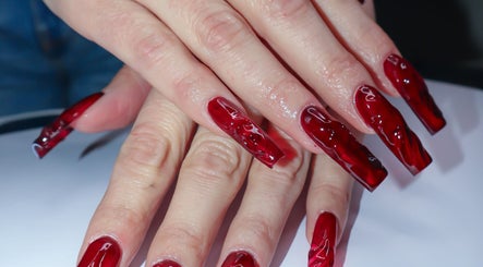 Elegant red nail art at Yanice Gianina Nails, Berlin, Berlin, DE showcasing intricate design.
