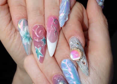 Intricate nail art at Yanice Gianina Nails in Berlin, Berlin, DE, featuring colorful, detailed designs.