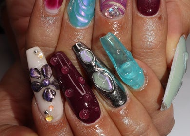Intricate nail designs from Yanice Gianina Nails in Berlin, Berlin, DE showcasing vibrant colors and patterns.
