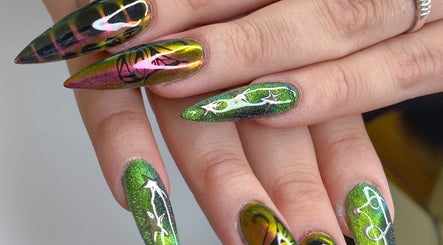 Intricate galaxy nail art at Yanice Gianina Nails, Berlin, Berlin, DE. Perfect for trendy, unique nail designs.