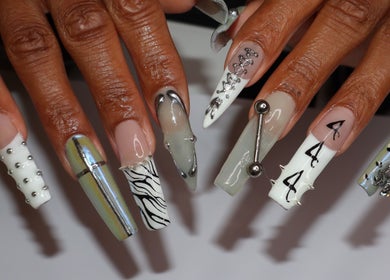Unique nail art at Yanice Gianina Nails, Berlin, Berlin, DE; featuring metallic and animal print designs.