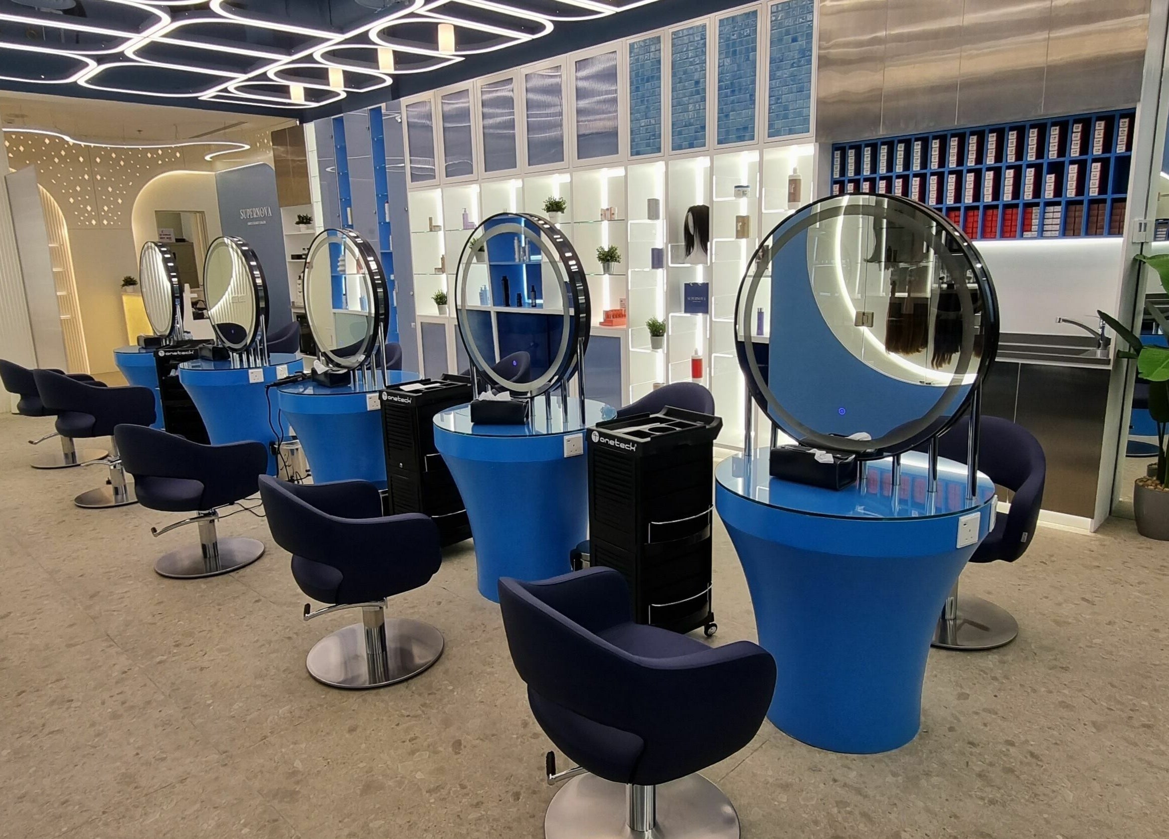 Modern interior of Supernova Salon Murooj in Riyadh, Riyadh Province, SA with chic styling stations.