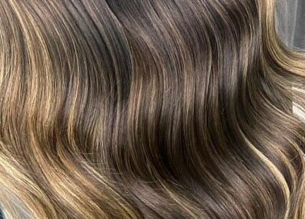 Lustrous highlighted hair styled at Supernova Salon Murooj, Riyadh, Riyadh Province, SA.