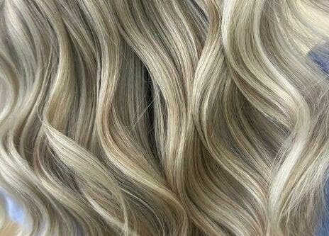 Beautiful blonde wavy hair styled at Supernova Salon Murooj, Riyadh, Riyadh Province, SA.