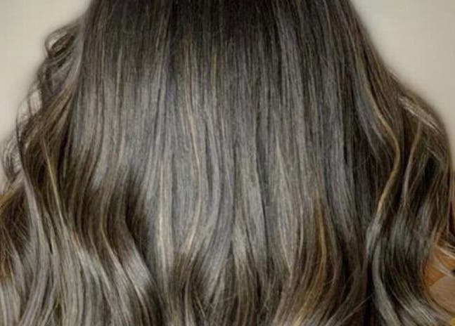 Glossy layered hair styled at Supernova Salon Olaya, Riyadh, Riyadh Province, SA, showcasing professional styling.