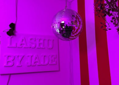 Lashubyjade in Cape Town, Western Cape, ZA, with a disco ball and vibrant lighting.