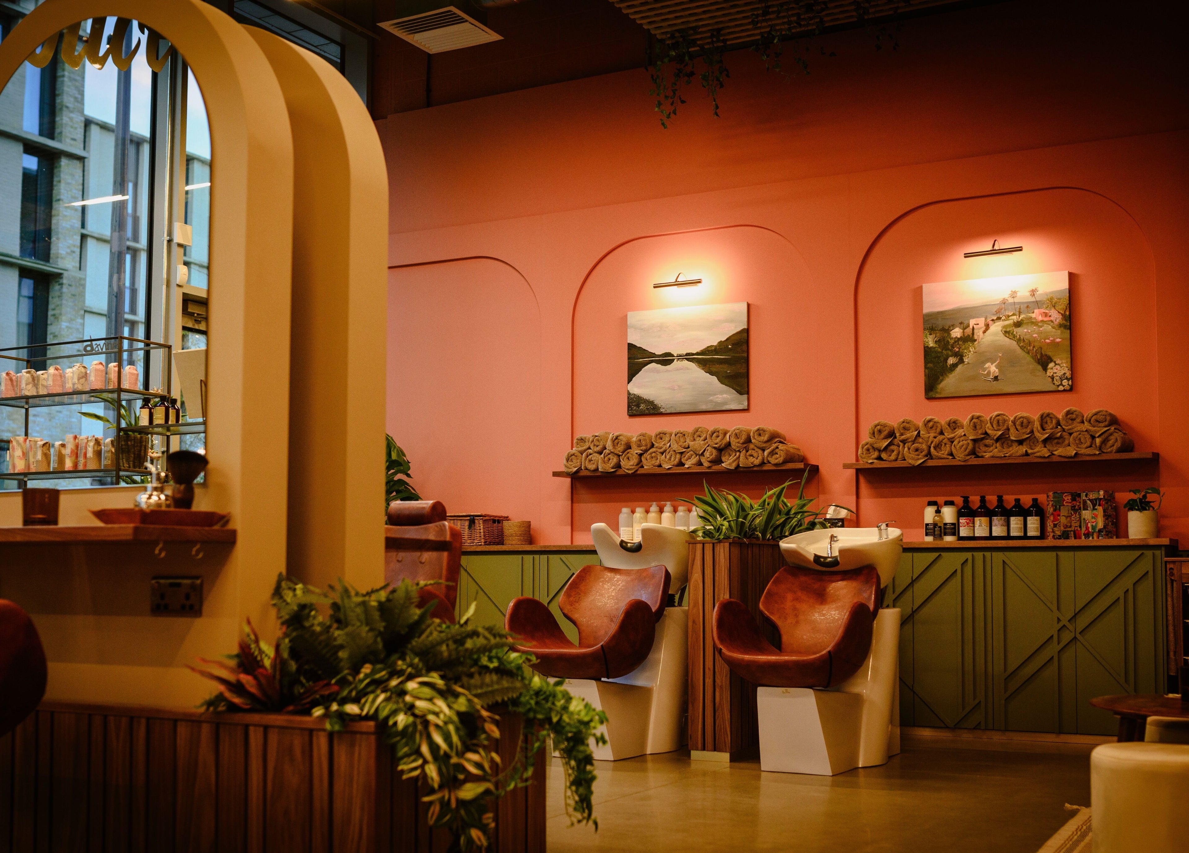 Douce Eddington salon's calming interior in Cambridge, England, GB with stylish chairs and decor.