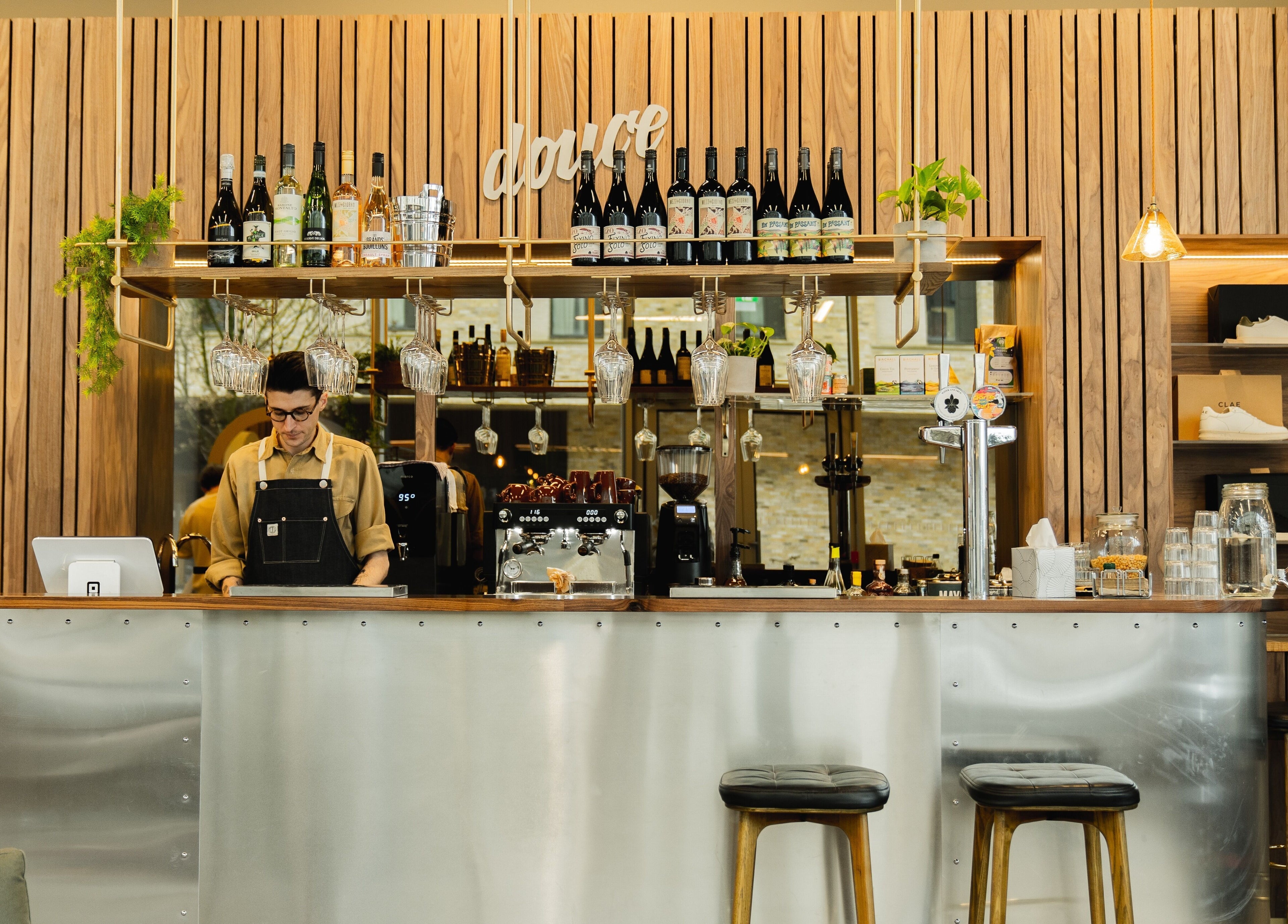 Sophisticated bar setting at Douce Eddington, Cambridge, England, GB, featuring elegant decor and premium spirits.