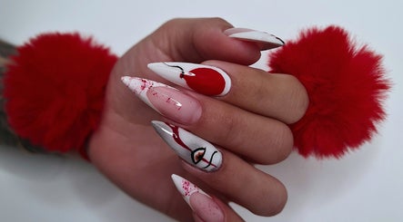 Stylish red and white artistic nails at Avc beauty (Castle Aesthetics), Colchester, England, GB.