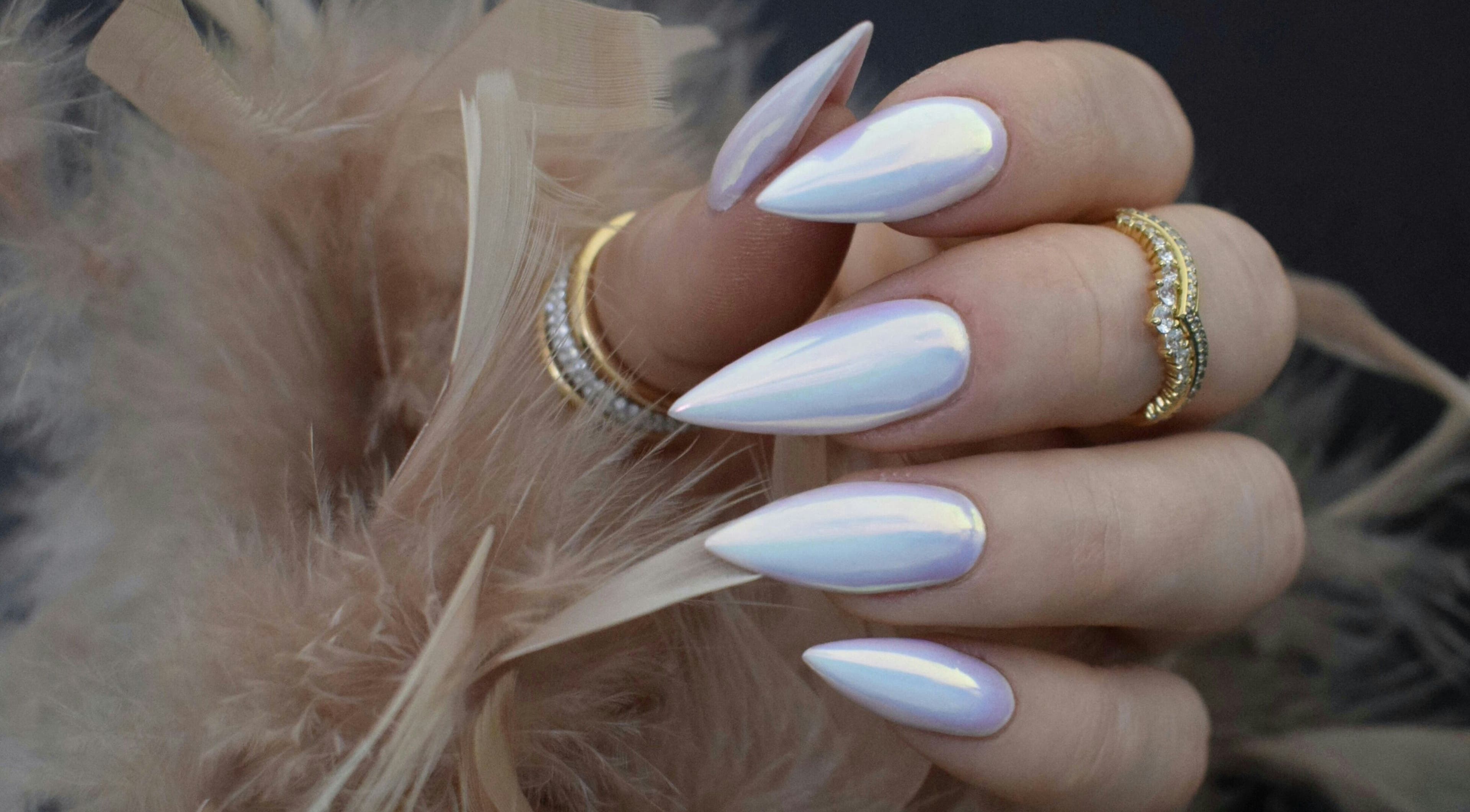 Elegant iridescent nails with gold rings at Avc beauty (Castle Aesthetics), Colchester, England, GB.