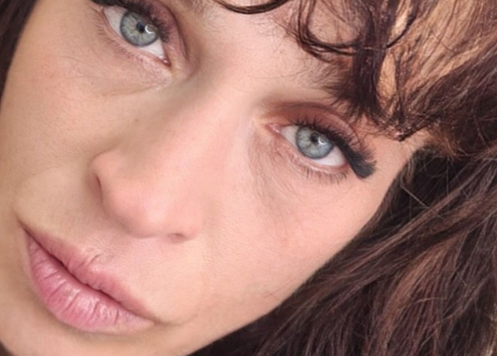 Close-up of a person with striking eyes at Avc Beauty Castle Aesthetics, Colchester, England, GB.