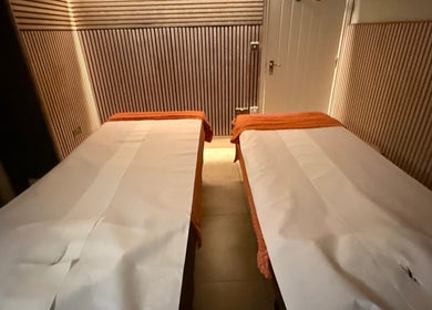 OPULENCE THAI SPA | Covent Garden massage room with twin beds in London, England, GB offering serene relaxation.
