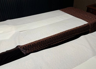 Relaxing massage beds at OPULENCE THAI SPA | Covent Garden, London, England, GB, offering tranquility and comfort.