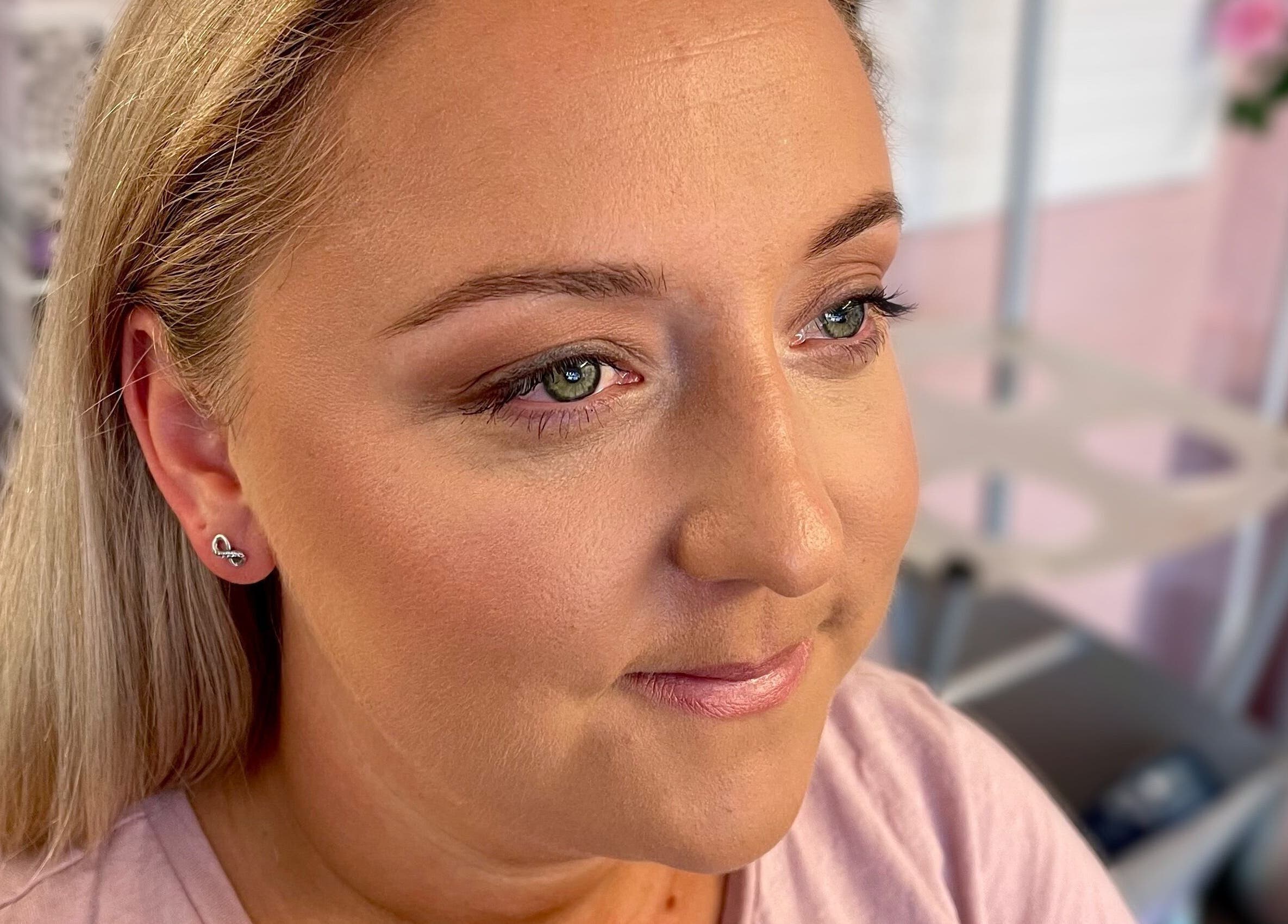 Client with radiant makeup at Michaela Hearne Beauty, Forest Town, England, GB showing natural elegance.