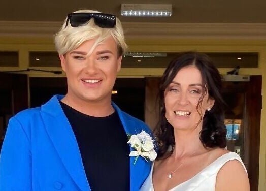 Stylish visitors at Michaela Hearne Beauty, Forest Town, England, GB. Bright blue attire and elegant smile.