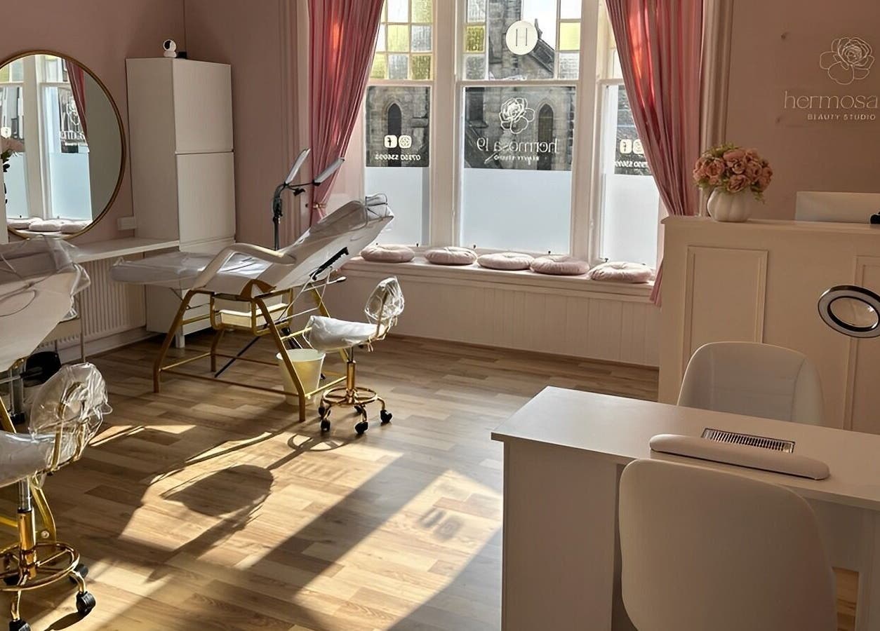 Elegant spa room at Hermosa19 Beauty, Peebles, Scotland, GB offers tranquil beauty treatments.