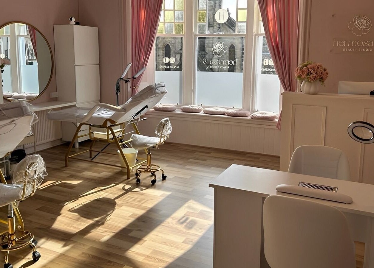 Elegant spa room at Hermosa19 Beauty, Peebles, Scotland, GB offers tranquil beauty treatments.