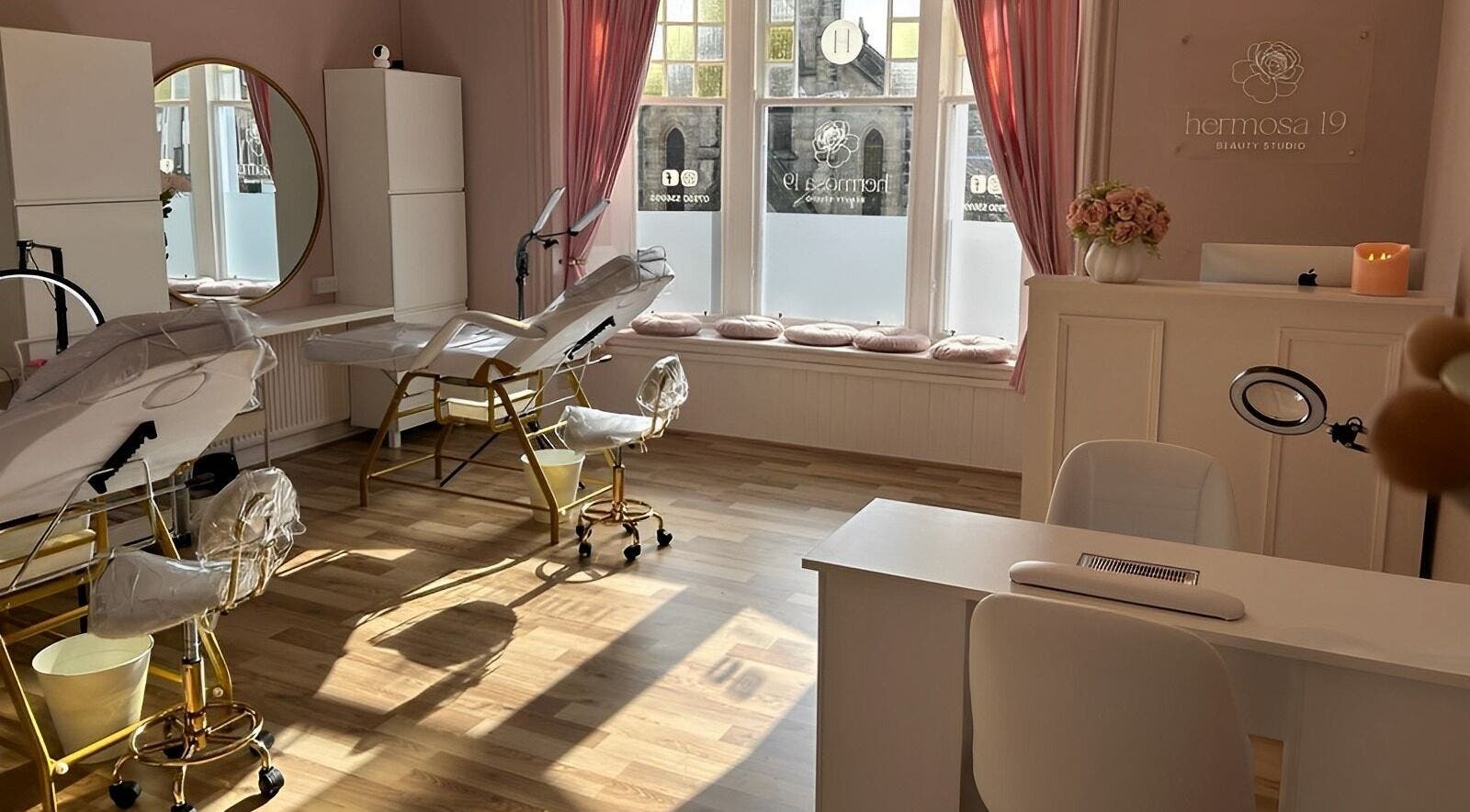 Elegant spa room at Hermosa19 Beauty, Peebles, Scotland, GB offers tranquil beauty treatments.
