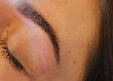 Close-up of perfectly groomed eyebrow at The Garden Room in Havant, England, GB. Ideal for beauty enthusiasts.