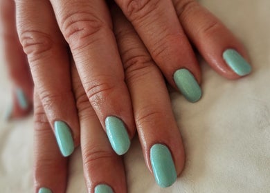 Aqua nail polish manicure at The Garden Room, Havant, England, GB.