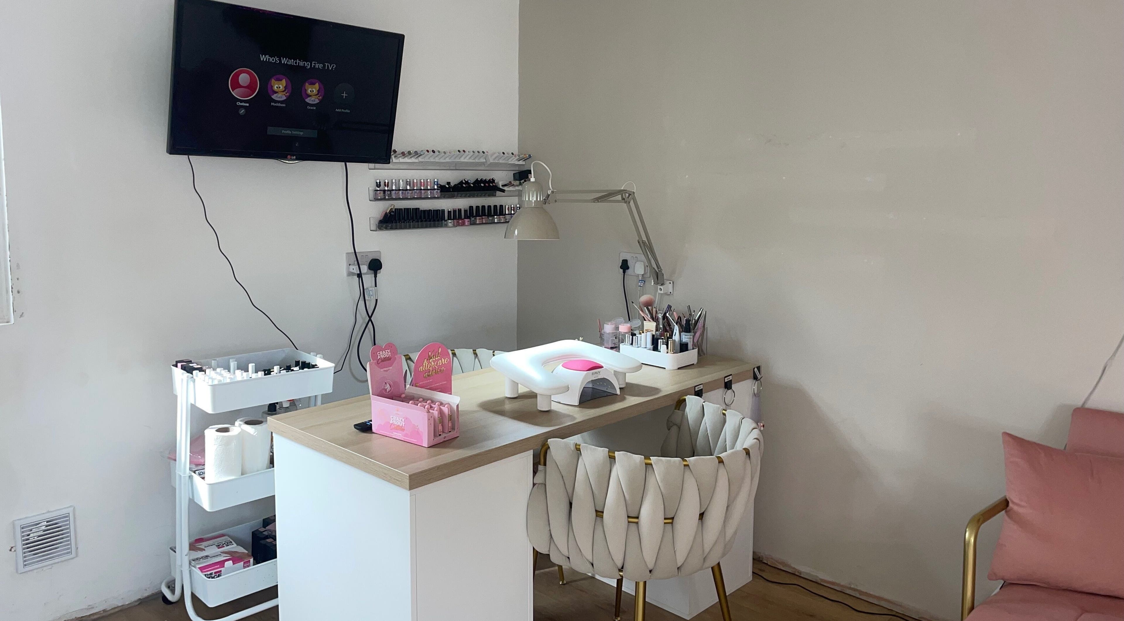 Nail station at The Beauty Cabin, Manchester, England, GB with manicure tools and comfortable seating.