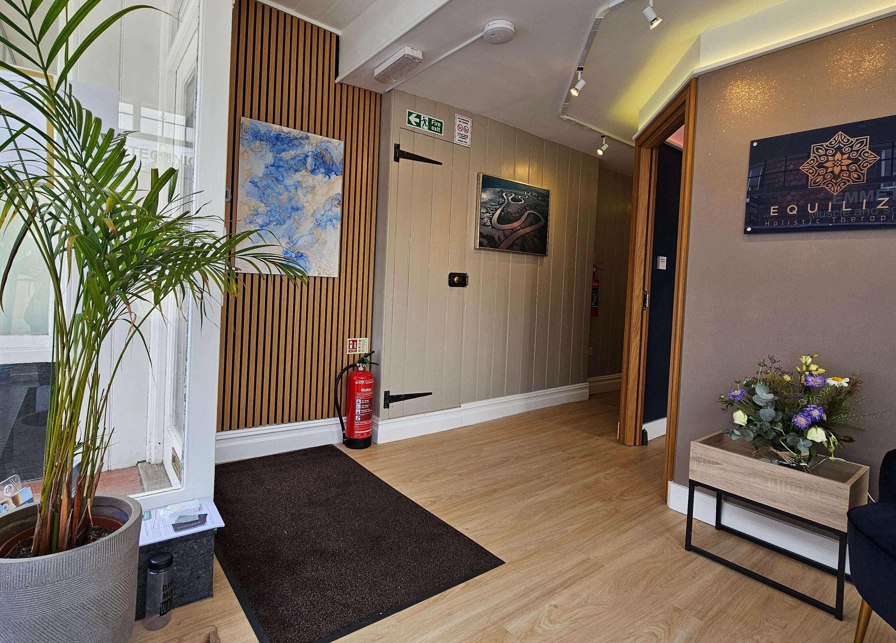 Welcoming entrance at Equilize Holistic Therapies, Wadhurst, England, GB with plants and a cozy atmosphere.