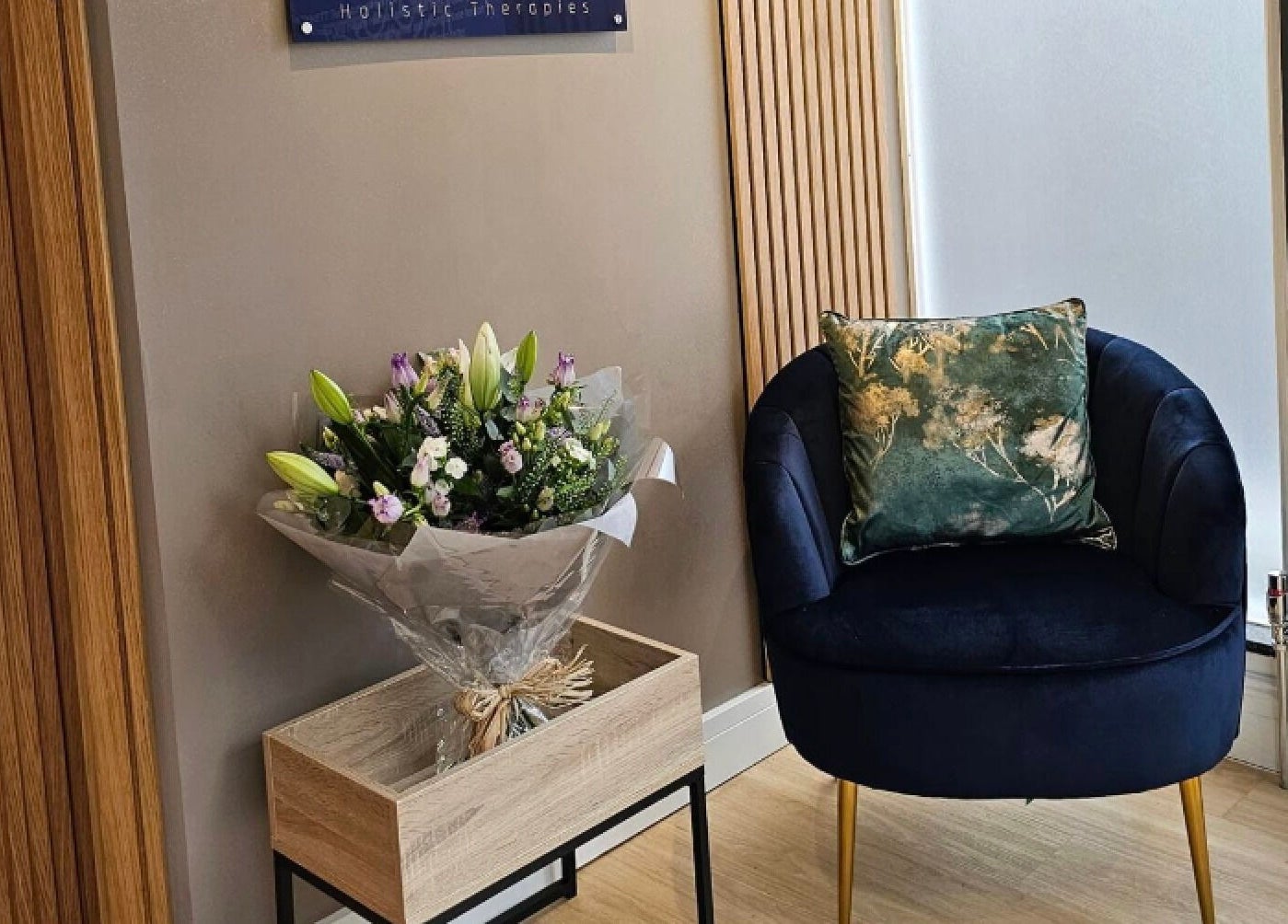 Cozy seating area with flowers at Equilize Holistic Therapies in Wadhurst, England, GB.