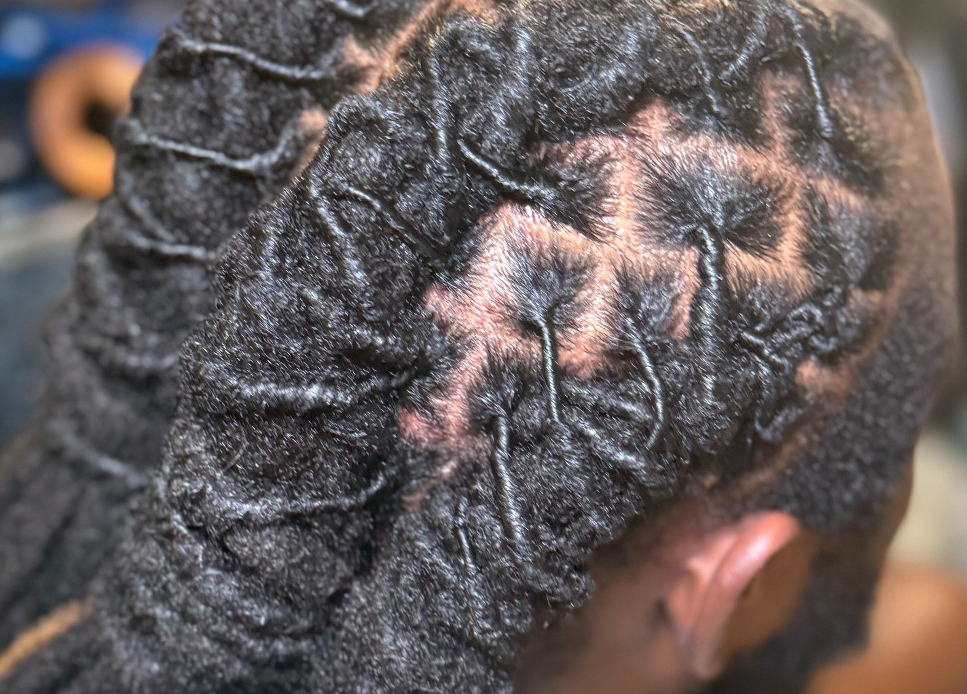 Close-up of intricately braided hair at Goldy Mane Collection, Miami, Florida, US.