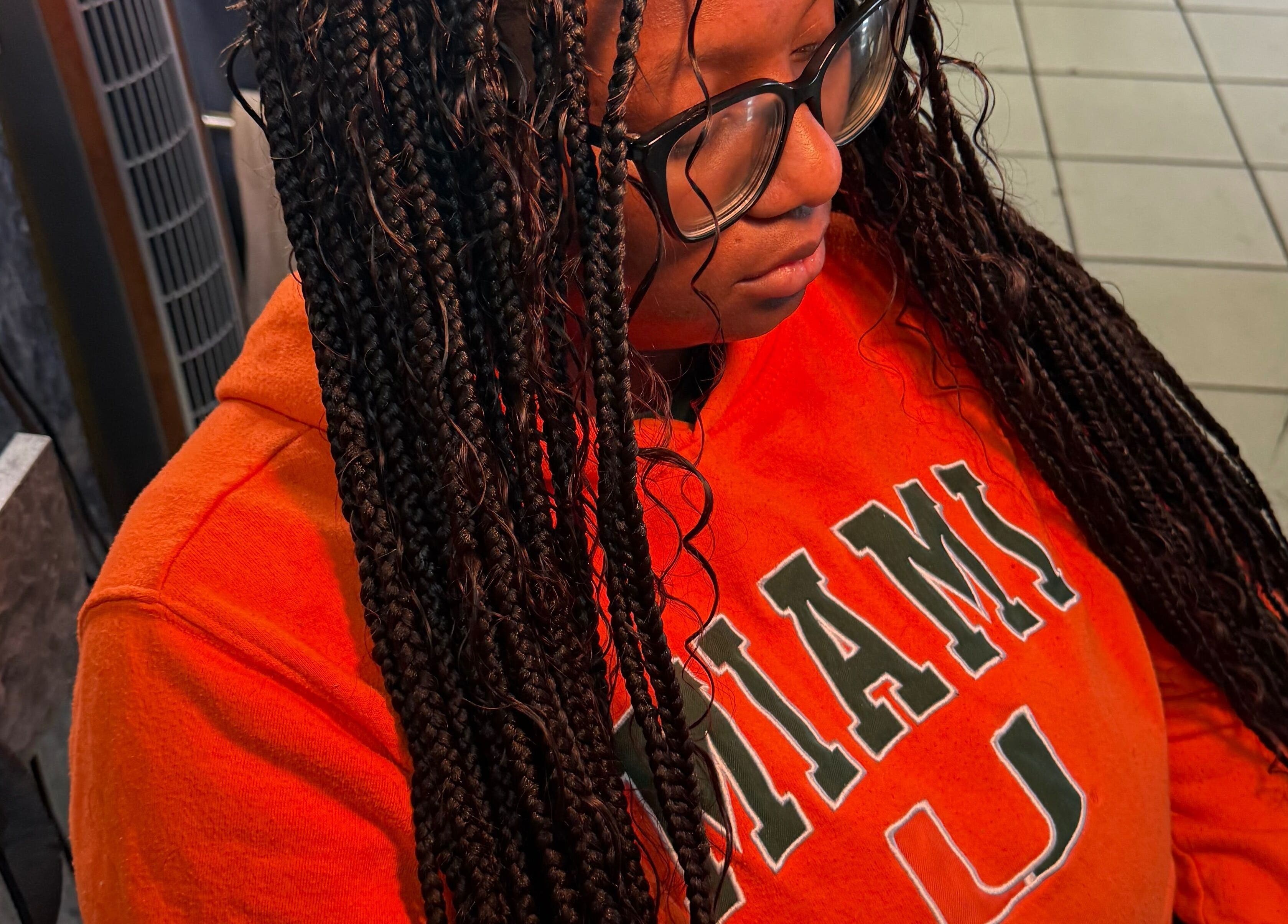 Intricate braided hairstyle at Goldy Mane Collection, Miami, Florida, US. Showcasing professional hair artistry.