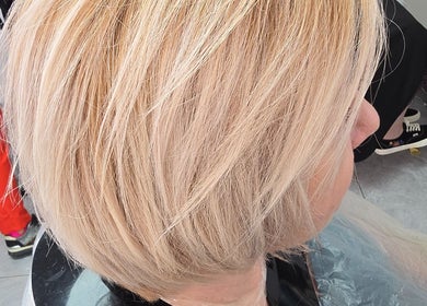 Fresh blonde bob hairstyle at AR Hair, Bathgate, Scotland, GB, showcasing expert styling.