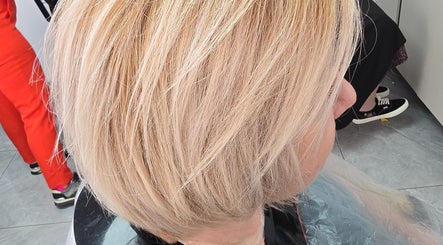 Fresh blonde bob hairstyle at AR Hair, Bathgate, Scotland, GB, showcasing expert styling.