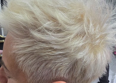 Chic blonde hairstyle at AR Hair, Bathgate, Scotland, GB. Perfect for modern, trendy looks.