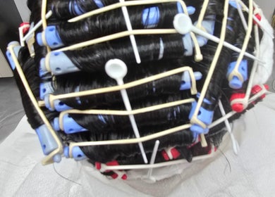 Close-up of vintage curlers used for a perm at AR Hair in Bathgate, Scotland, GB.