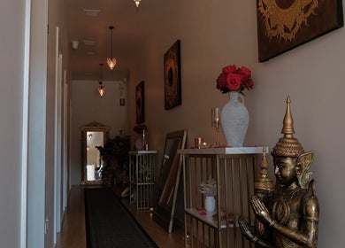 Elegant hallway at Cheewa Aroma Remedial Thai, featuring art and decor in Melbourne, Victoria, AU.